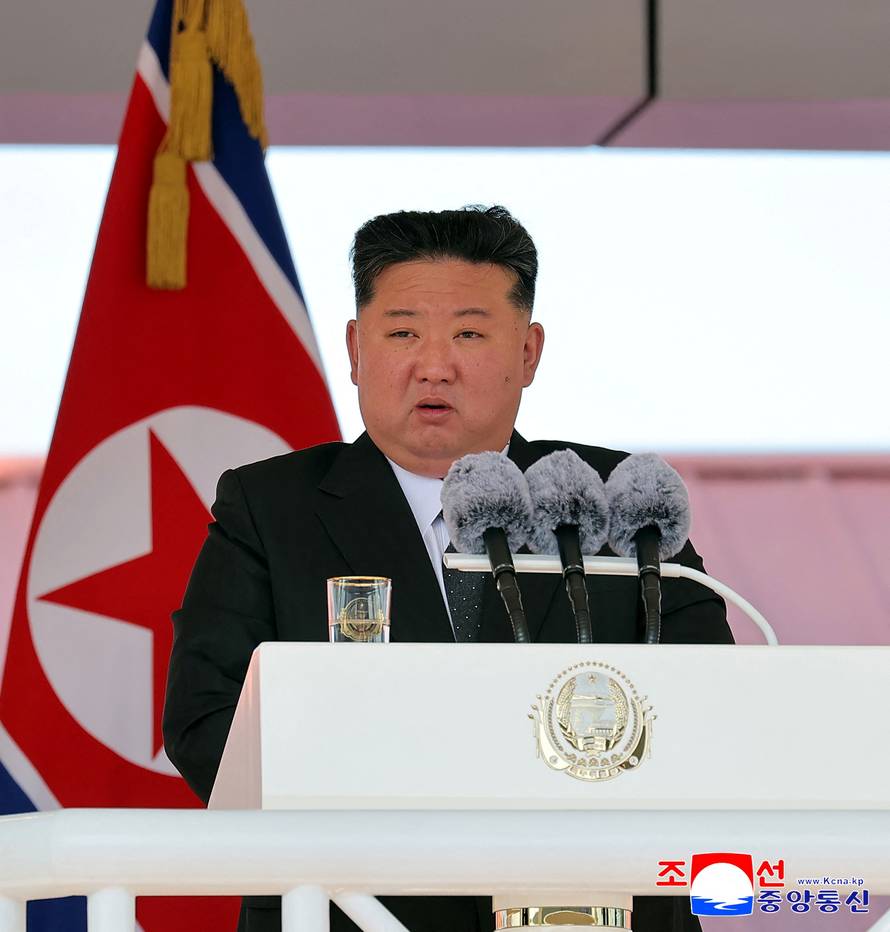 North Korean leader Kim Jong Un attends the launching ceremony of a warship that had been damaged upon its first attempt to launch
