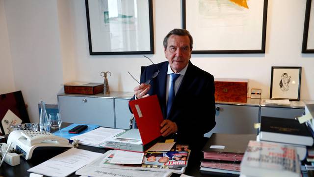 FILE PHOTO: Former German Chancellor Gerhard Schroeder is pictured during an interview with Reuters in his office in Berlin
