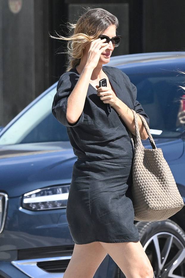 PREMIUM EXCLUSIVE: *FEE TO BE AGREED* Pregnant Gisele Bundchen wears a cute black mini-dress as she runs errands in Miami