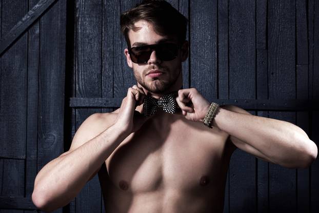 Handsome man in sunglasses, portrait of fashion style guy.