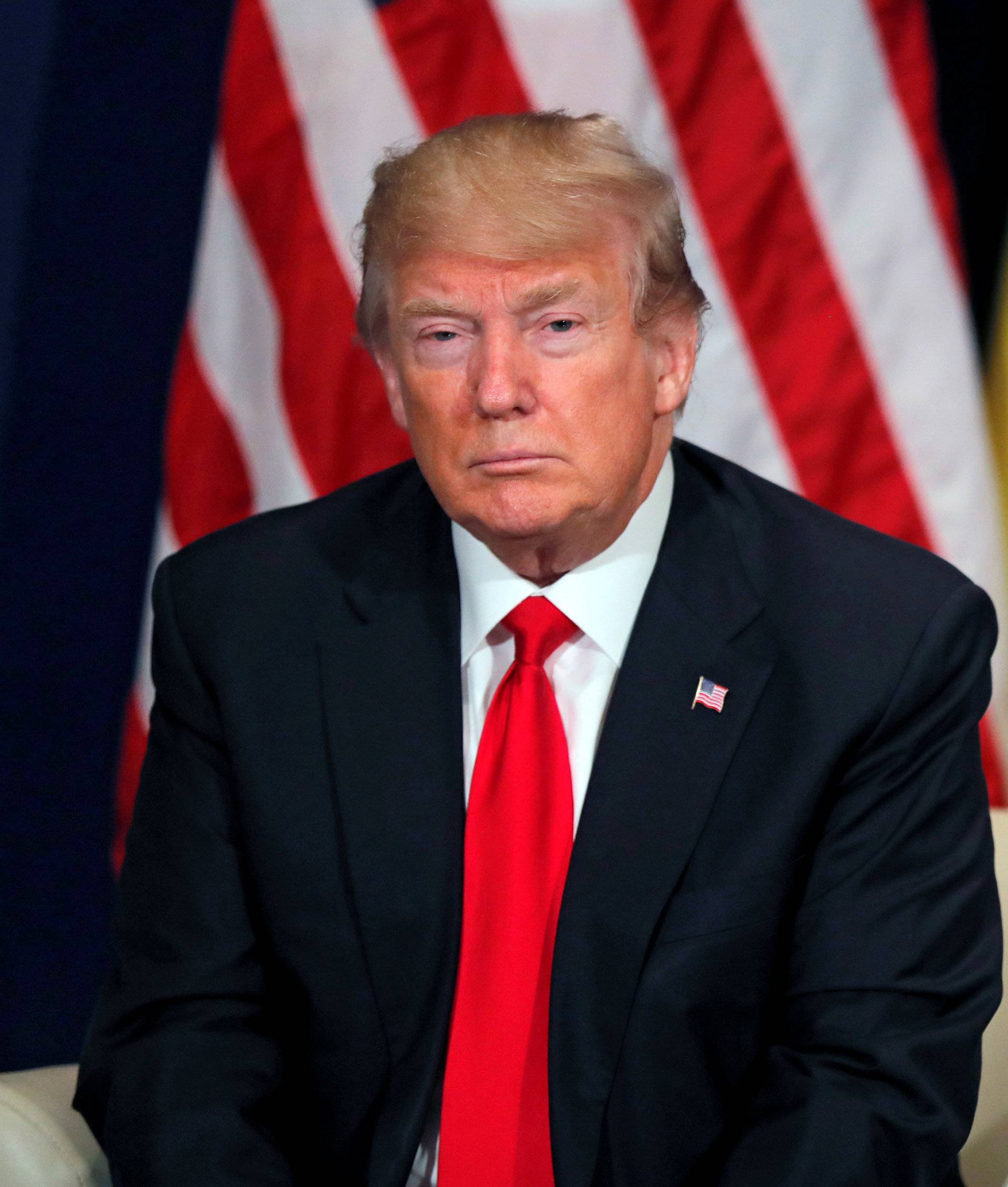 U.S. President Trump looks on as he meets President Kagame of Rwanda during the World Economic Forum annual meeting in Davos