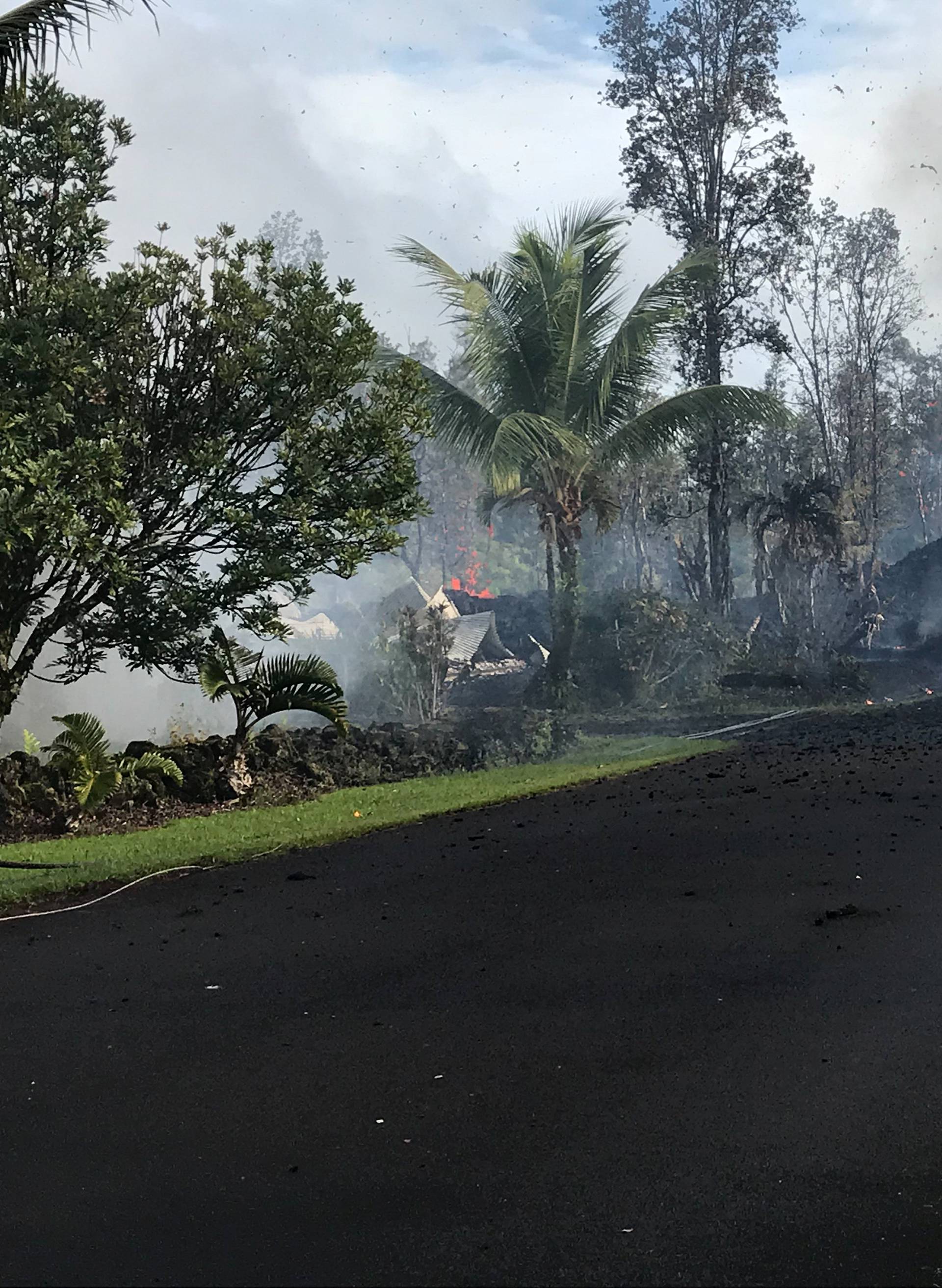 A fissure on Leilani and Kaupili Streets in the Leilani Estates subdivision caused by an eruption of the Kilauea Volcano following a series of earthquakes, in Hawaii