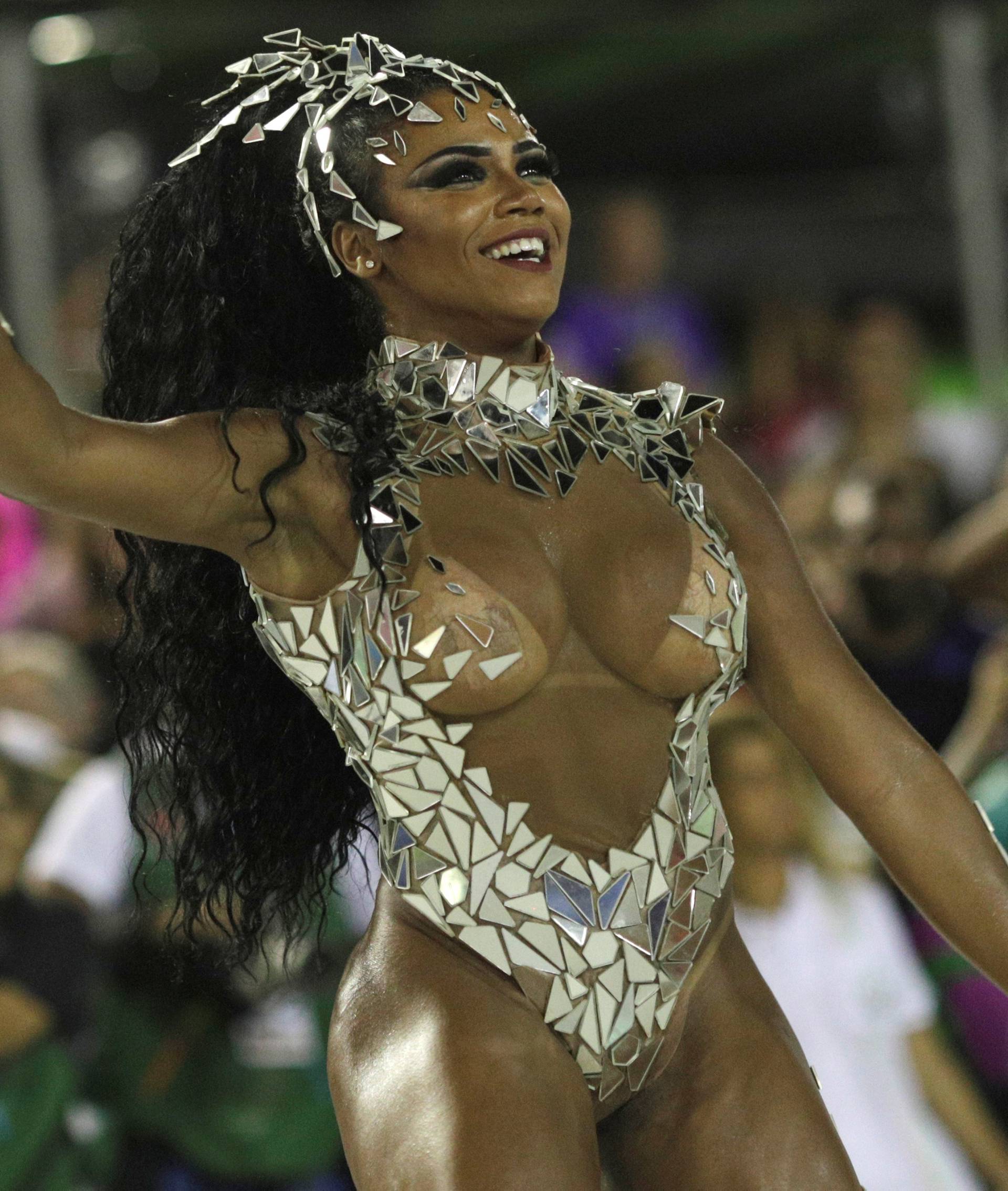 Drum queen Evelyn Bastos from Mangueira samba school perform during the first night of the Carnival parade at the Sambadrome in Rio de Janeiro