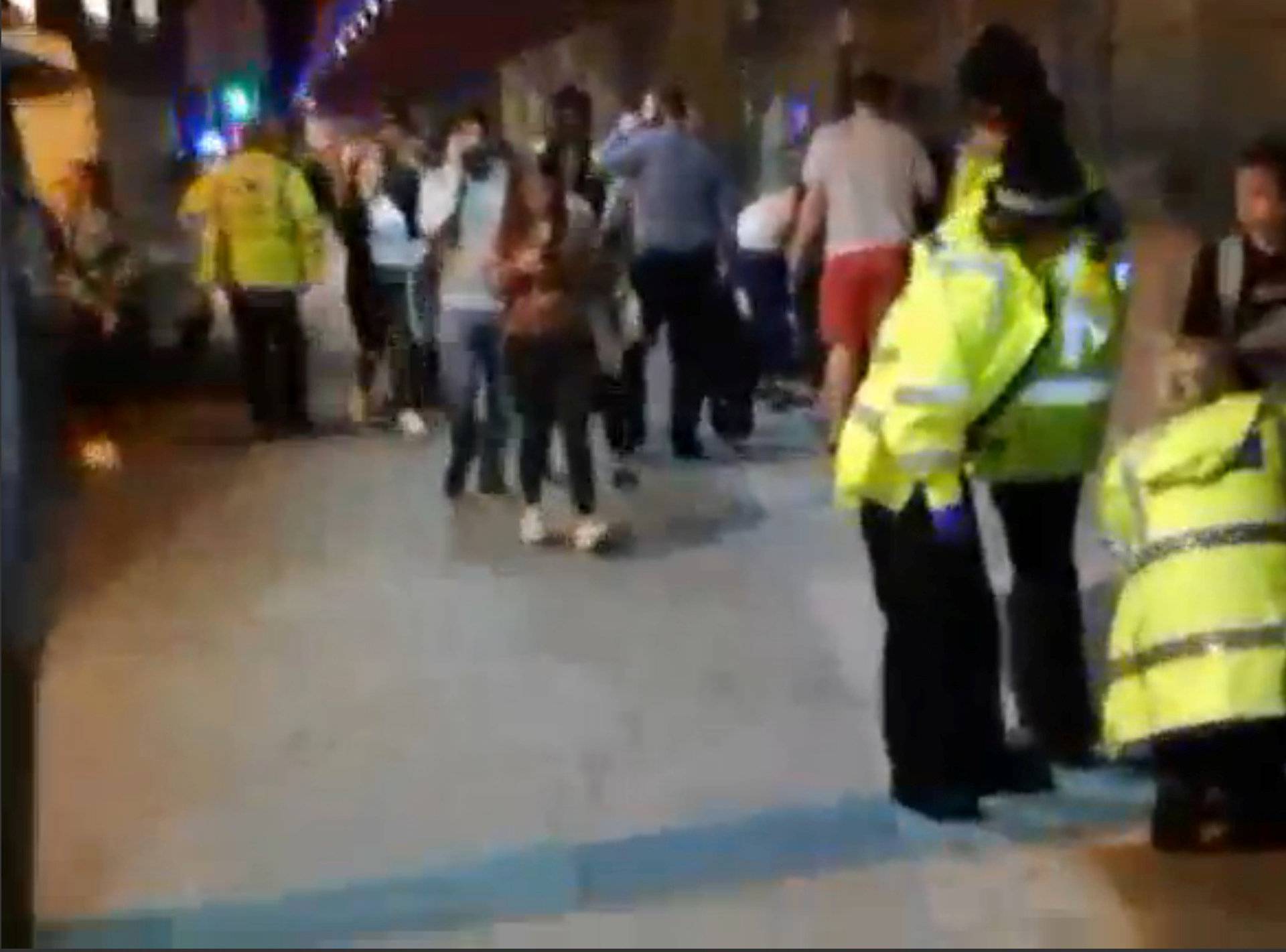 Still image taken from video shows a street scene near Manchester Arena after a blast, where U.S. singer Ariana Grande had been performing, in Manchester, Britain