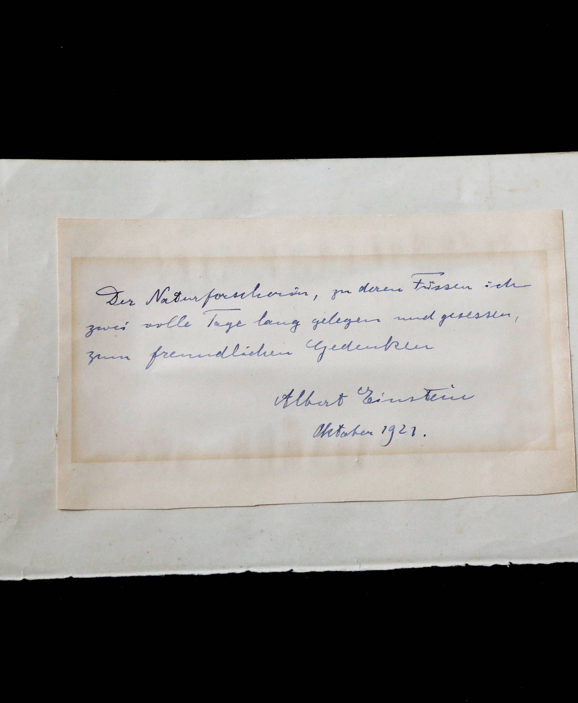 A note written by Albert Einstein to Italian chemistry student Elisabetta Piccini in Florence, Italy, in 1921 is seen before it is sold at an auction in Jerusalem