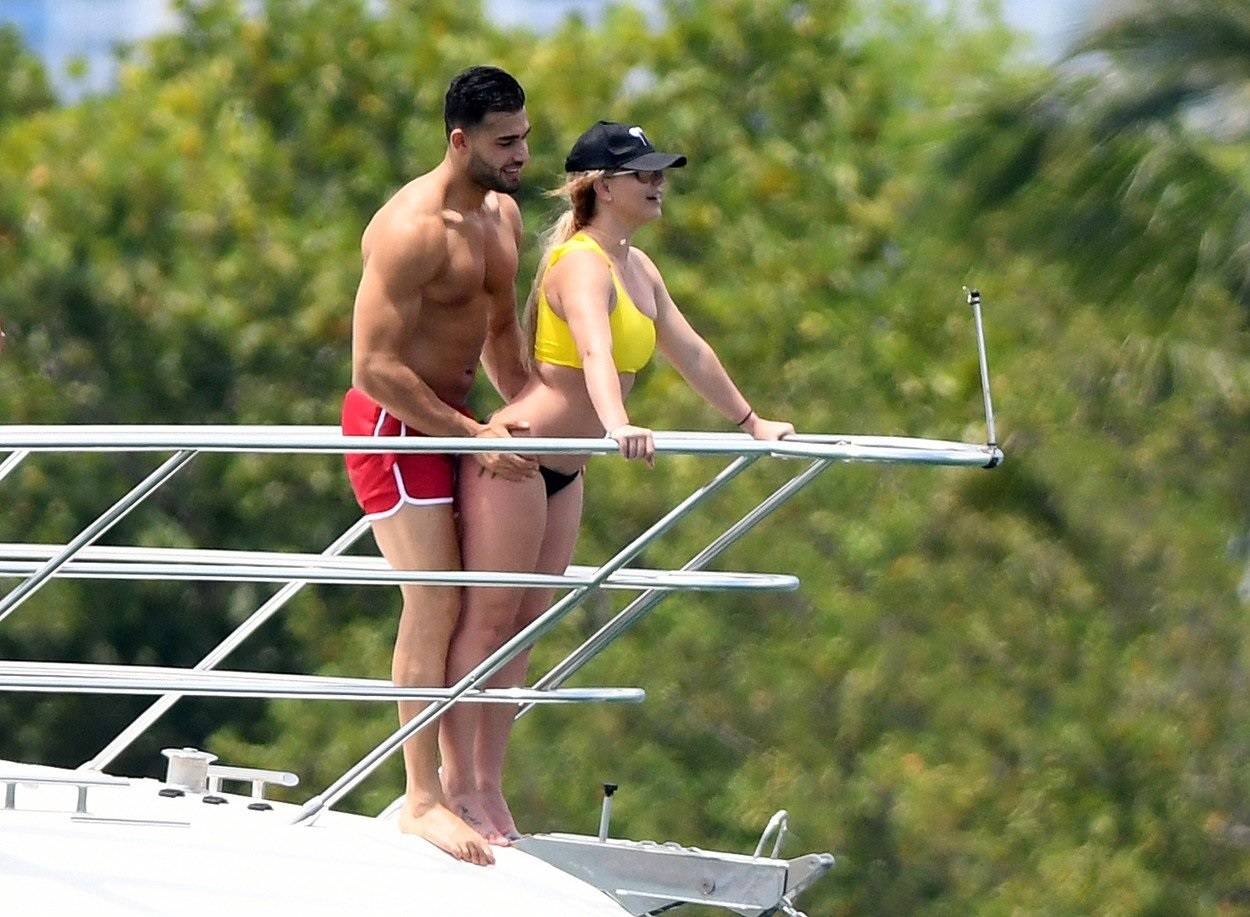 *NO WEB UNTIL 1900 BST 10TH JUNE PREMIUM EXCLUSIVE* Britney Spears wears a yellow bikini as she has an action-packed afternoon on a yacht with boyfriend Sam Asghari in Miami