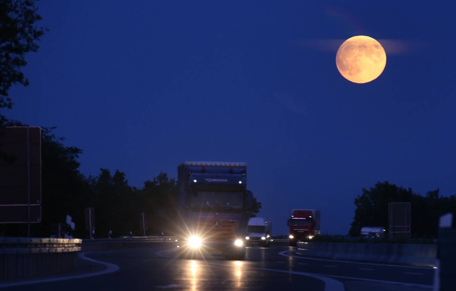 Full moon via motorway