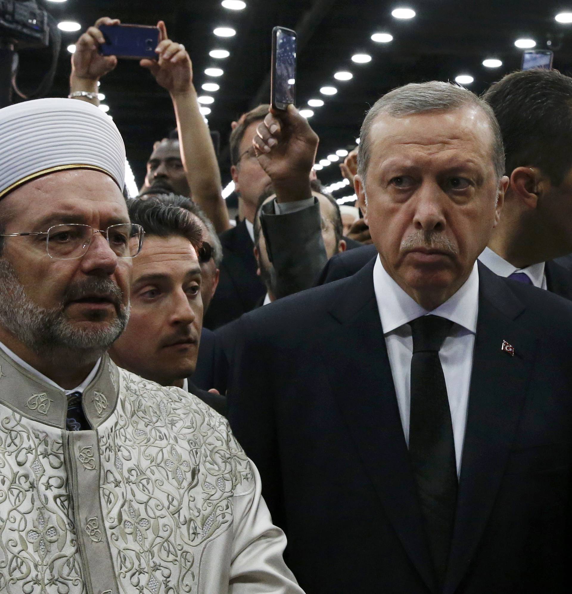 Turkish President Tayyip Erdogan attends the jenazah, an Islamic funeral prayer, for the late boxing champion Muhammad Ali in Louisville