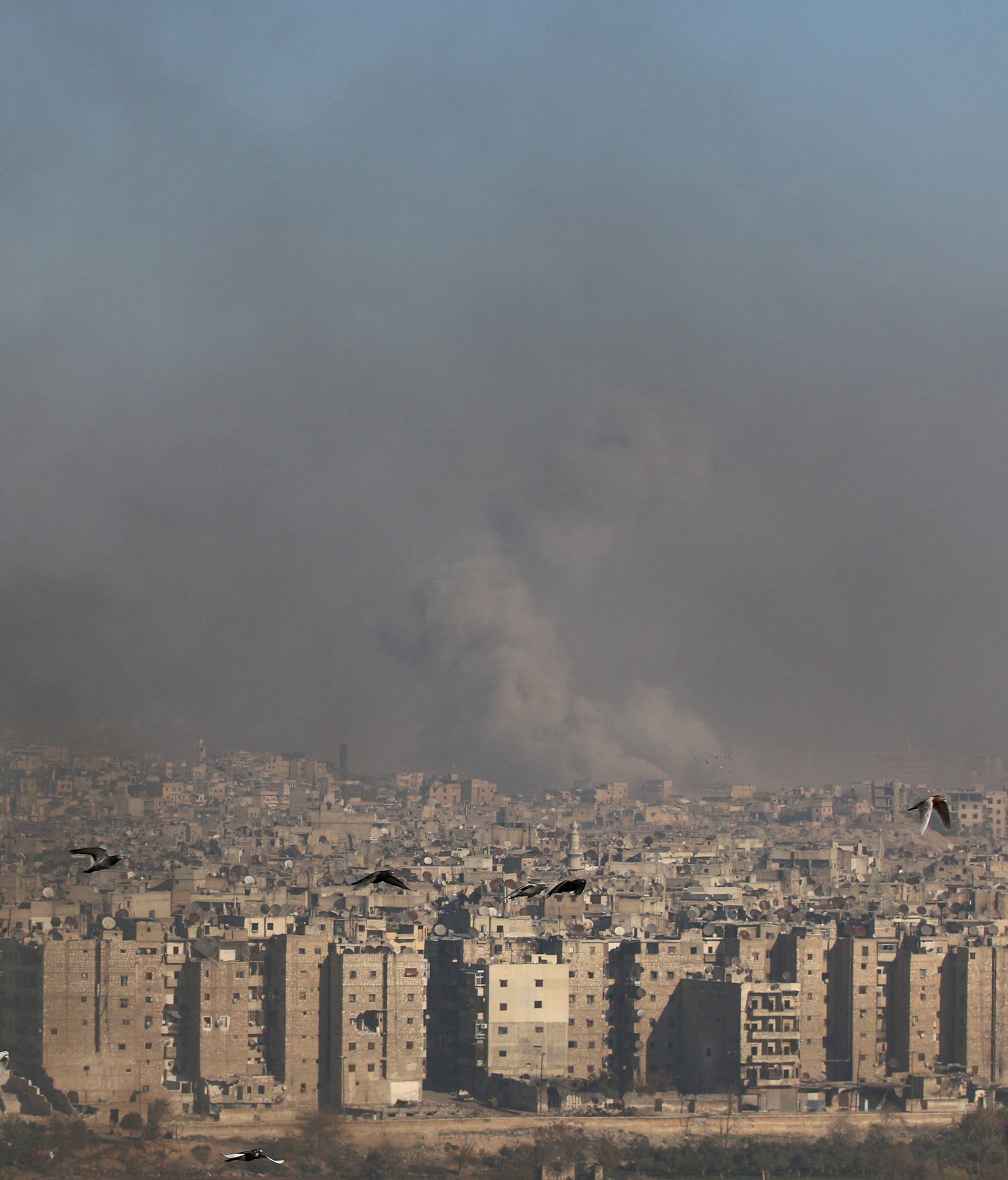 Smoke rises from a rebel-held area of Aleppoo