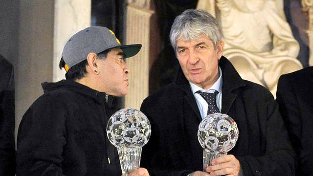 Diego Maradona and Paolo Rossi pose for a photo as they attend the Italian football hall of fame awards ceremony