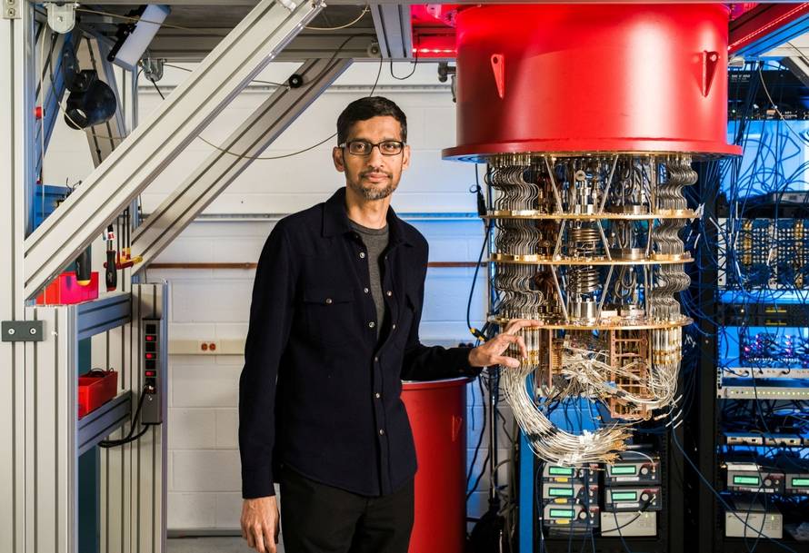 A handout picture shows Sundar Pichai with one of Google's Quantum Computers in the Santa Barbara lab