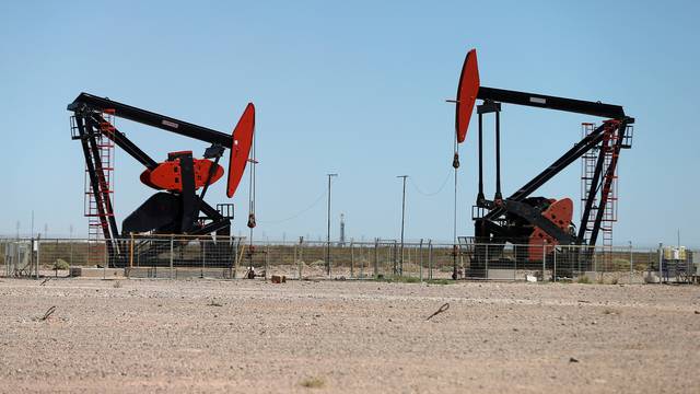 FILE PHOTO: Oil pump jacks are seen at Vaca Muerta shale oil and gas drilling, in the Patagonian province of Neuquen