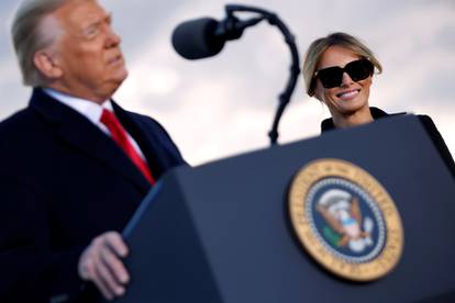 First lady Trump smiles at Joint Base Andrews, Maryland