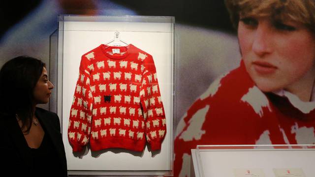 A 'black sheep' jumper worn by Britain's late Diana, Princess of Wales, goes up for auction at Sotheby's, in London