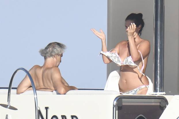 *PREMIUM-EXCLUSIVE* MUST CALL FOR PRICING BEFORE USAGE  - STRICTLY NOT AVAILABLE FOR ONLINE USAGE UNTIL 22:00 PM UK TIME ON 07/08/2022 - Italian operatic tenor Andrea Bocelli and his wife Veronica Berti put on a 'Cheeky' display during their sun-soaked 