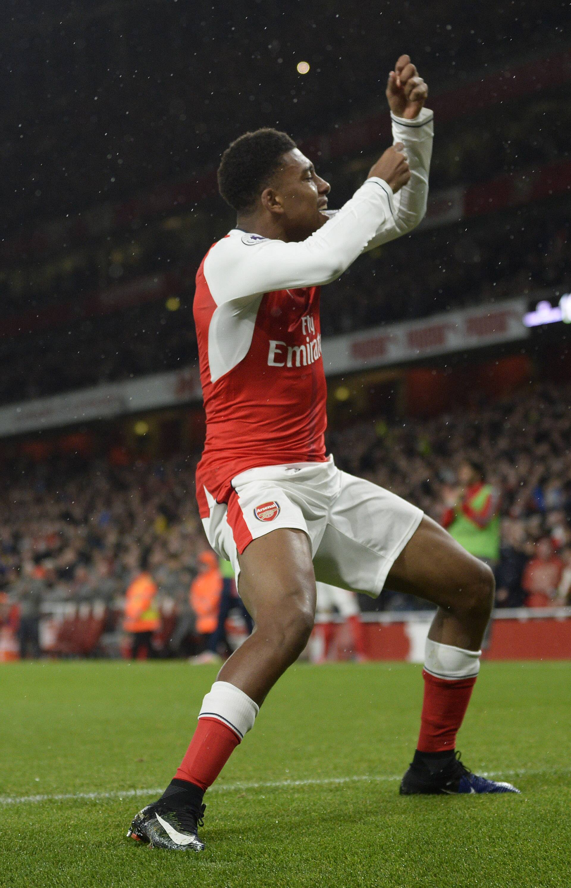 Arsenal's Alex Iwobi celebrates scoring their third goal