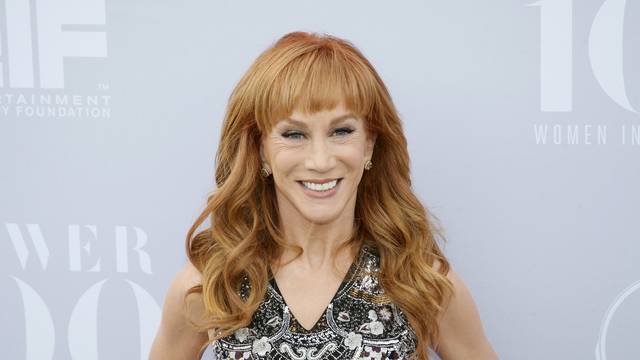 FILE PHOTO: Comedian Kathy Griffin poses at The Hollywood Reporter's Annual Women in Entertainment Breakfast in Los Angeles, California