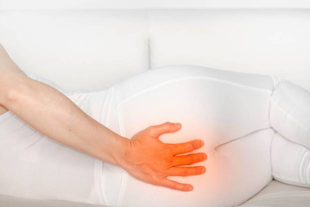 Woman,With,Bottom,Pain,Or,Coccyx.acute,Pain,In,A,Woman