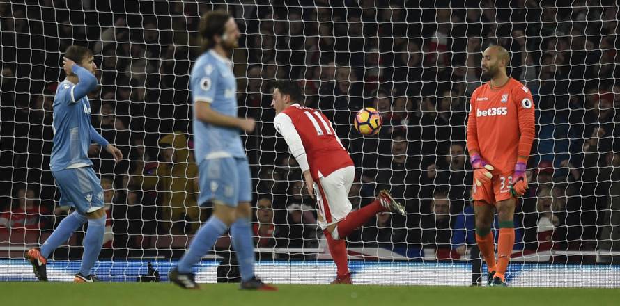 Arsenal's Mesut Ozil celebrates scoring their second goal