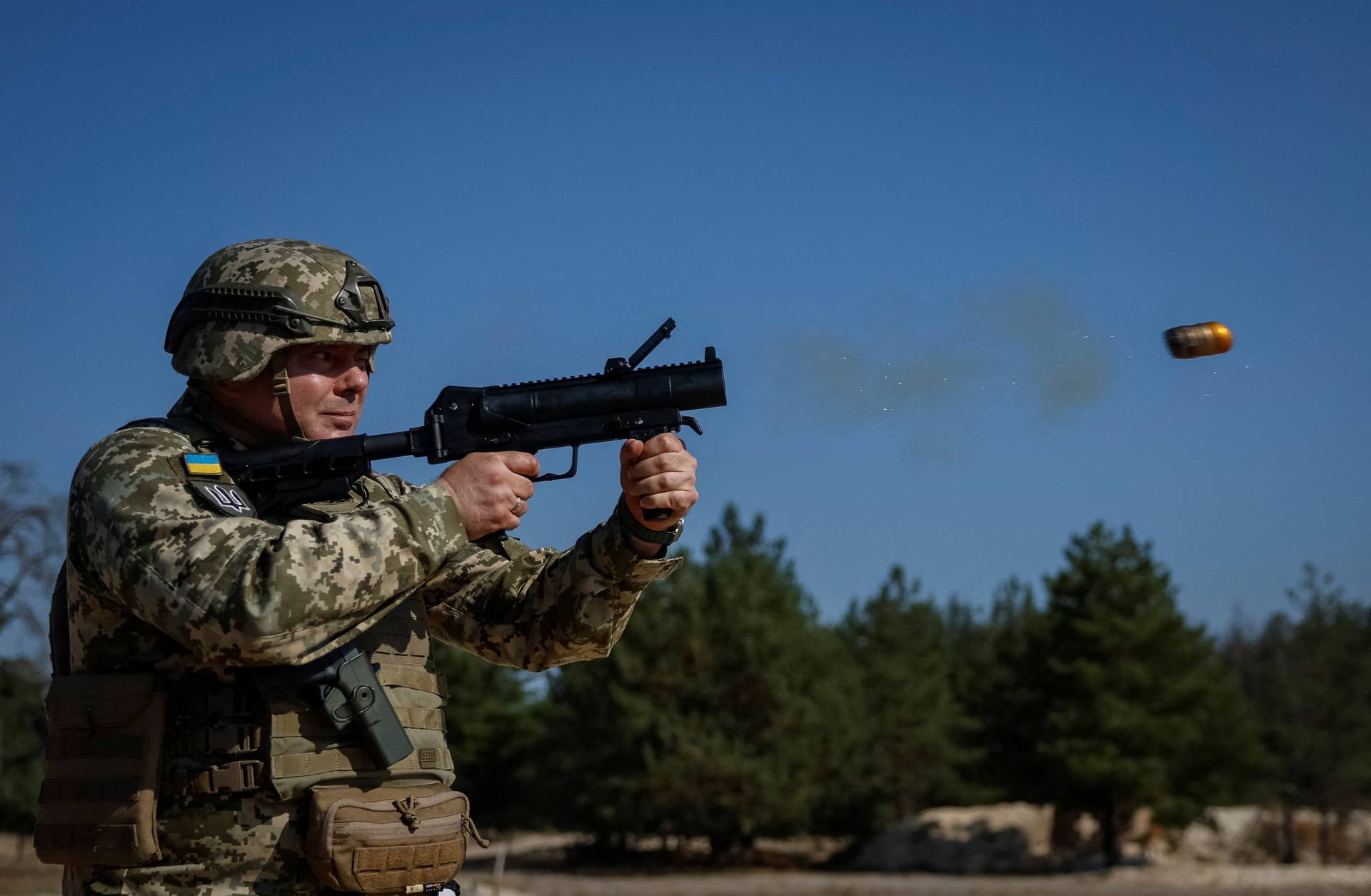 Ukrainian servicemen attend a military exercise in Kyiv region