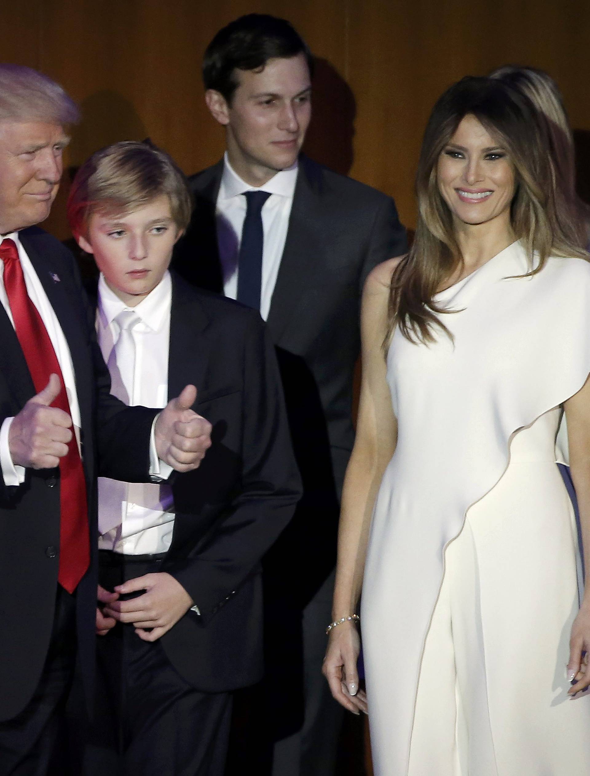 U.S. President-elect Donald Trump greets supporters along with his wife and family during his election night rally in Manhattan