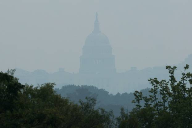 Smoke from Canadian wildfires clouds the National Mall and monuments in Washington
