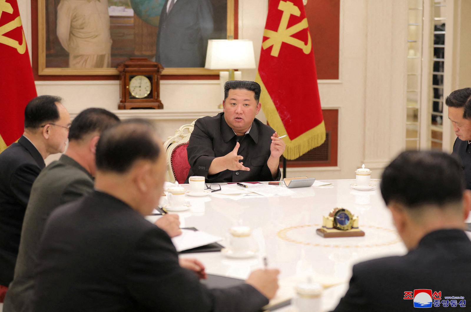 North Korean leader Kim Jong Un presides over a politburo meeting of the ruling Workers' Party