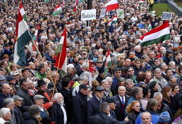 People gather during a ceremony marking the 60th anniversary of 1956 anti-Communist uprising in Budapest