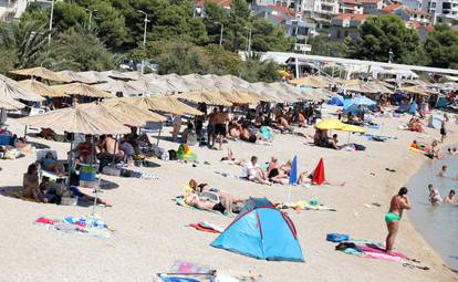 FOTO Spas od paklenog vala mnogi su potražili u rijekama i morima: Plaže krcate turistima