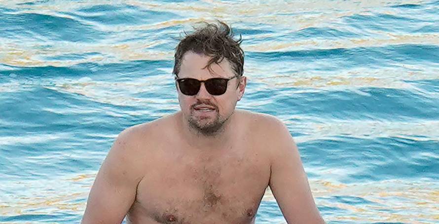 PREMIUM EXCLUSIVE: Leonardo DiCaprio in swim shorts and girlfriend Camila Morrone in a skimpy black bikini enjoy the beach in St Barts