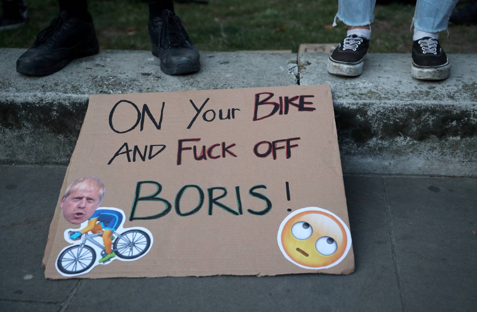 People demonstrate against newly appointed British Prime Minister Boris Johnson outside Downing Street in London