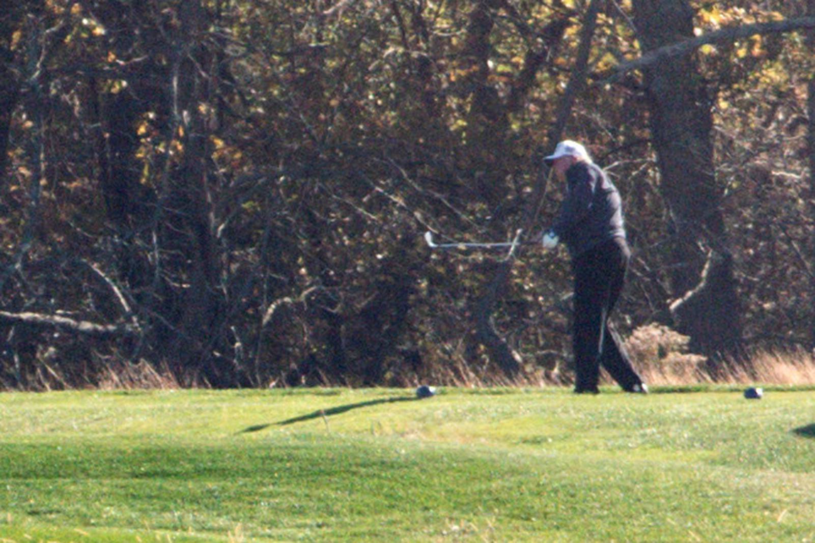 U.S. President Donald Trump plays golf after the 2020 U.S. presidential election was called for Democratic presidential candidate former Vice President Joe Biden at the Trump National Golf Club in Sterling, Virginia