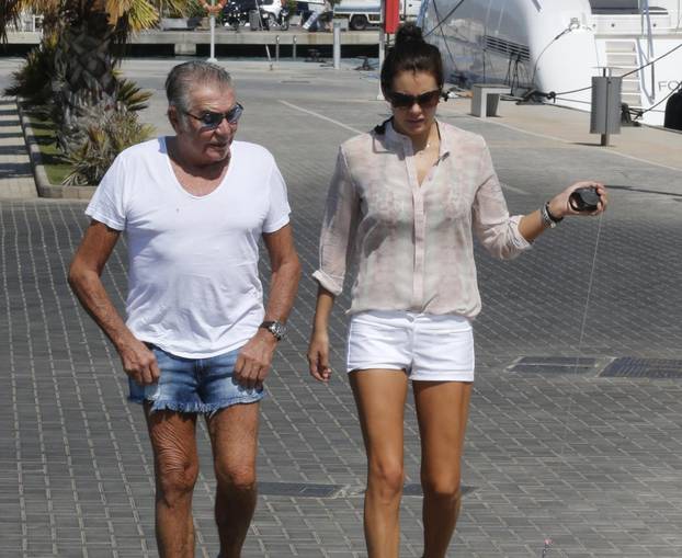 Roberto Cavalli And Girlfriend Walk Their Dogs - Ibiza