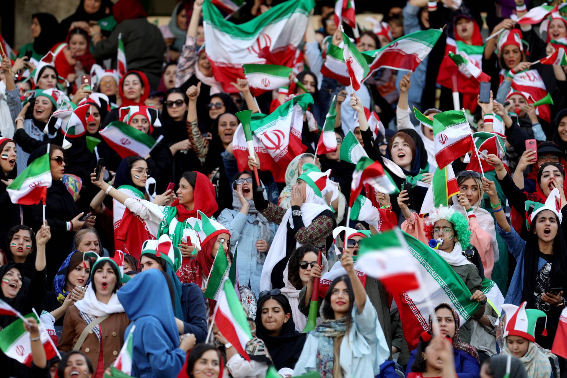 Iranian women fans arrive to attend Iranâs FIFA World Cup Asian qualifier match against Cambodia, as for the first time women are allowed to watch the national soccer team play in over 40 years, at the Azadi stadium in Tehran
