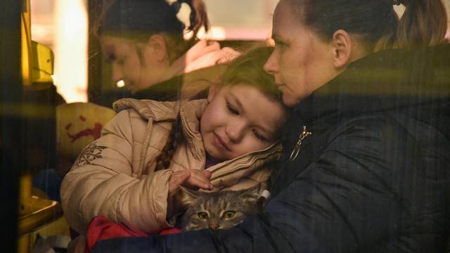 Refugees flee the Russian invasion of Ukraine, in Lviv