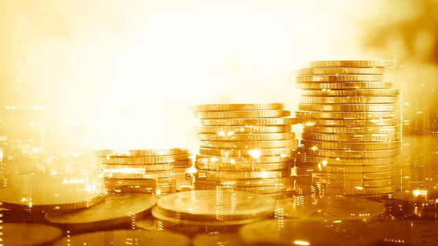 Double,Exposure,Of,City,And,Stack,Of,Coins,For,Finance