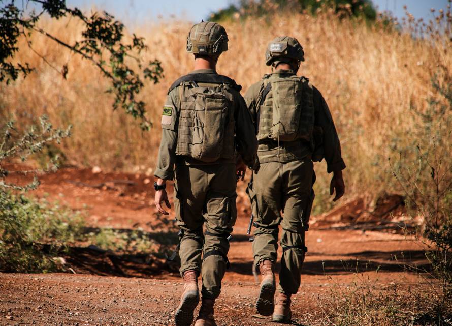 Israeli soldiers patrol, after the Israeli military said it killed one person in an incident in which they returned fire, by the Israel-Lebanon border in northern Israel