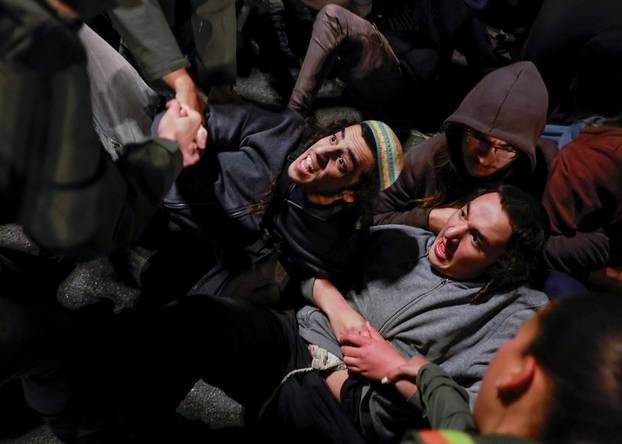 Israelis protest a ceasefire deal, in Jerusalem