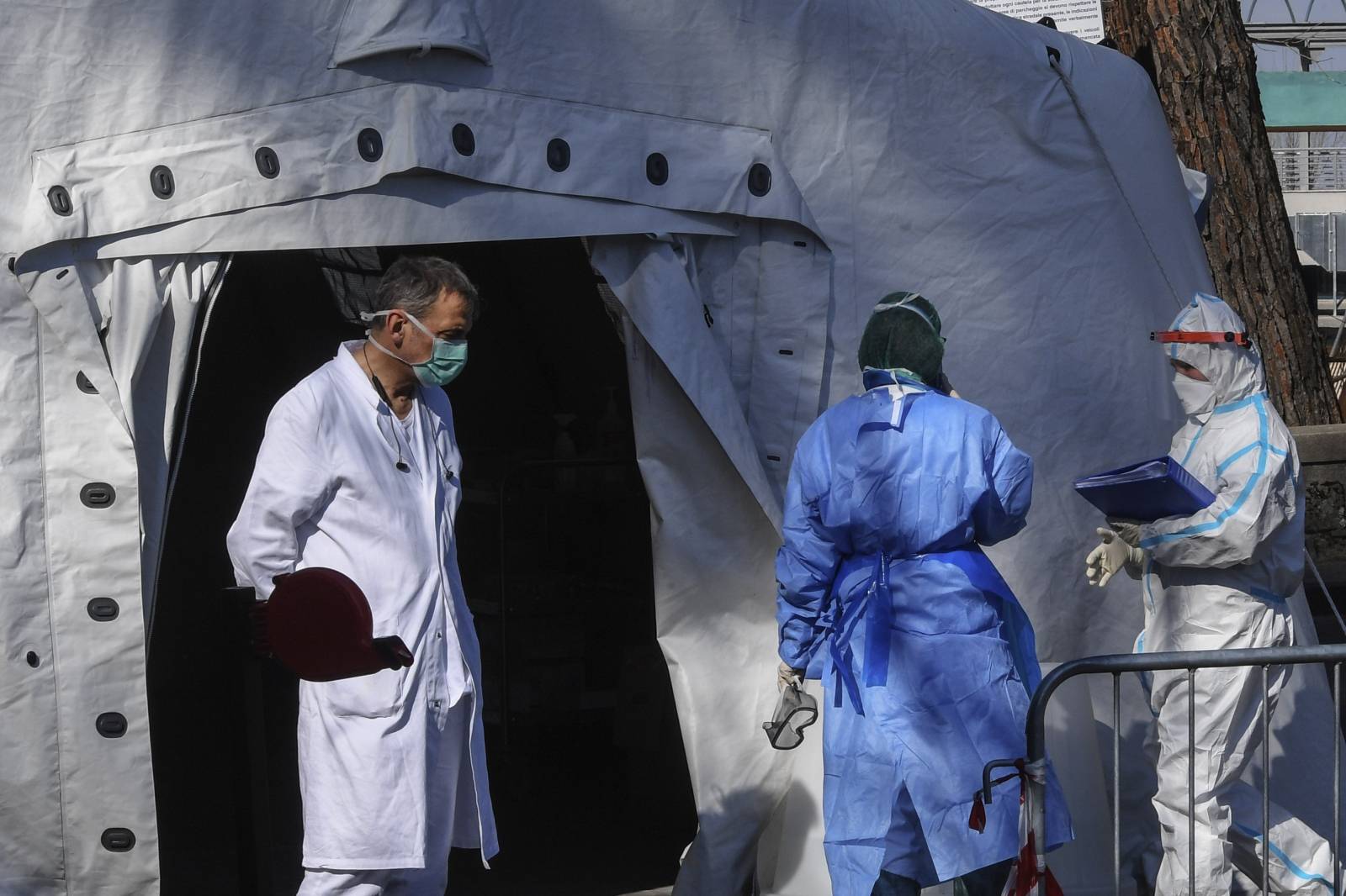 Doctors with masks at the Cotugno hospital emergency room for infectious diseases, in Naples city.