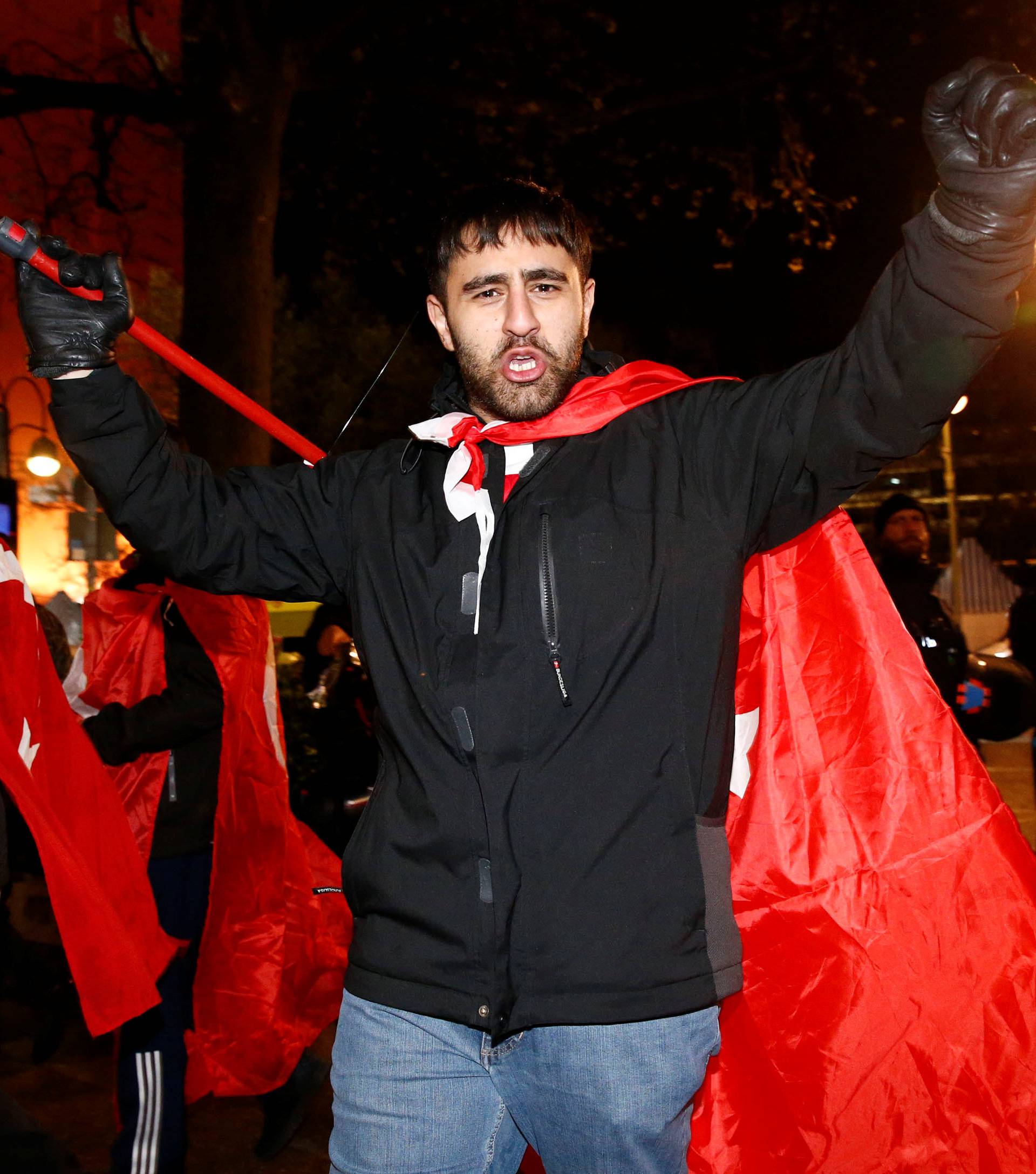 People of the Turkish community living in Germany celebrate on Kurfuerstendamm boulevard on the outcome of Turkey's referendum on the constitution, in Berlin
