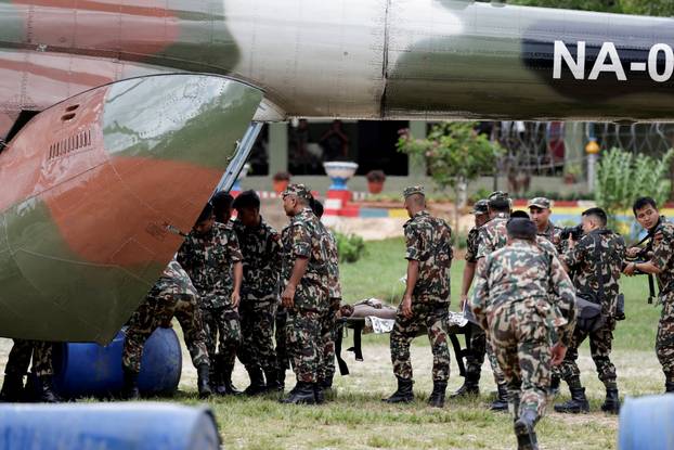 A survivor is airlifted following a flash flood at Trishuli, Nepal