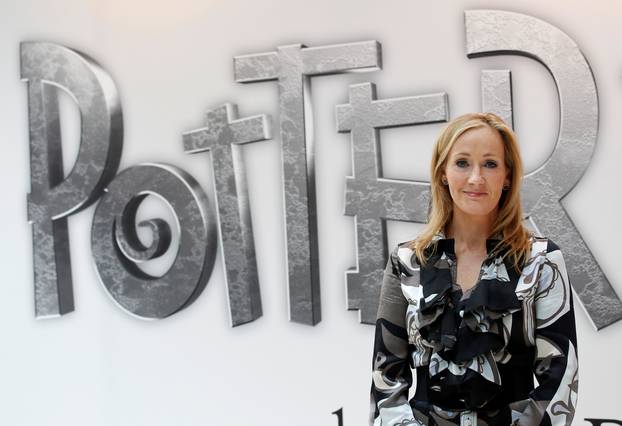 FILE PHOTO: British author JK Rowling, creator of the Harry Potter series of books, poses during the launch of new online website Pottermore in London