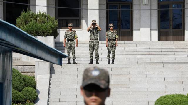 North Korean soldiers patrol in the truce village of Panmunjom