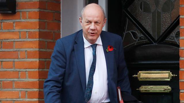 Damian Green, Britain's Prime Minister Theresa May's deputy, leaves his home in London