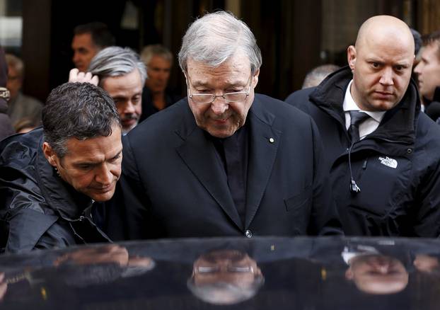 FILE PHOTO Australian Cardinal George Pell leaves at the end of a meeting with the victims of sex abuse in Rome