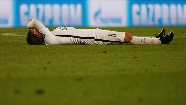 Paris Saint-Germain's Marco Verratti looks dejected after the game