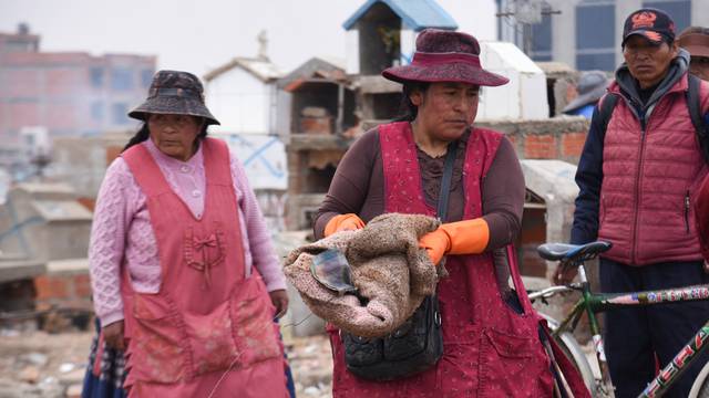 Families exhume bodies as part of a cemetery is demolished, in El Alto