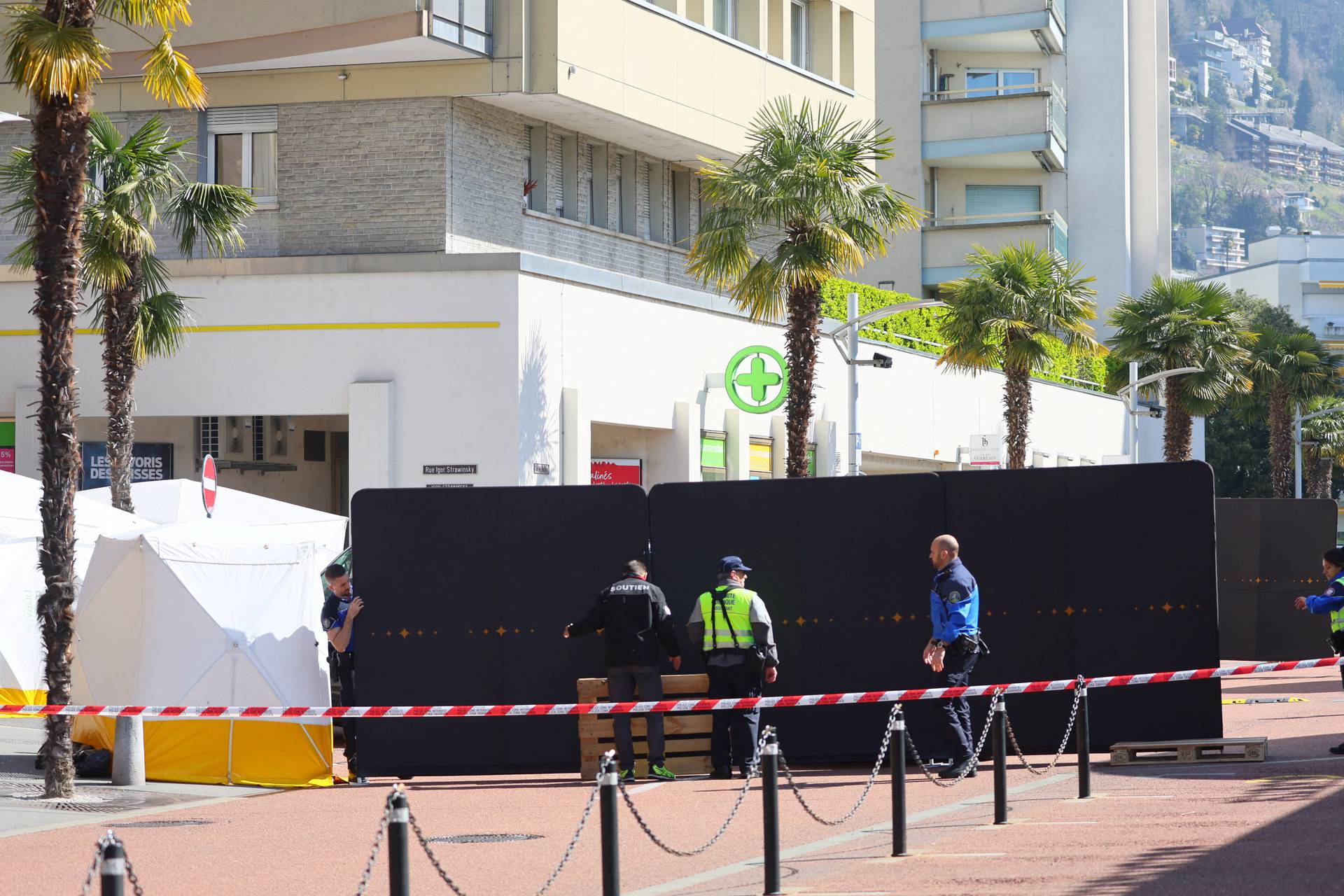 Police officers install a protection in Montreux