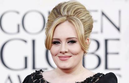 Zbog dosadnih paparazza i stresa Adele bježi u Ameriku
