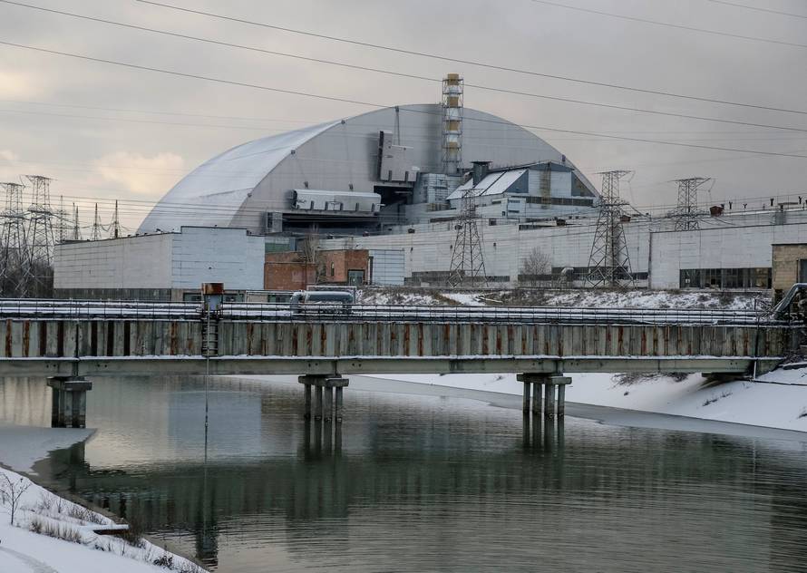 A general view shows a New Safe Confinement structure over the old sarcophagus covering the damaged fourth reactor at the Chernobyl nuclear power plant, in Chernobyl